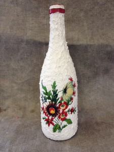Avdelning: Bruksföremål. Beskrivning: Flaska med gips och dekal.
